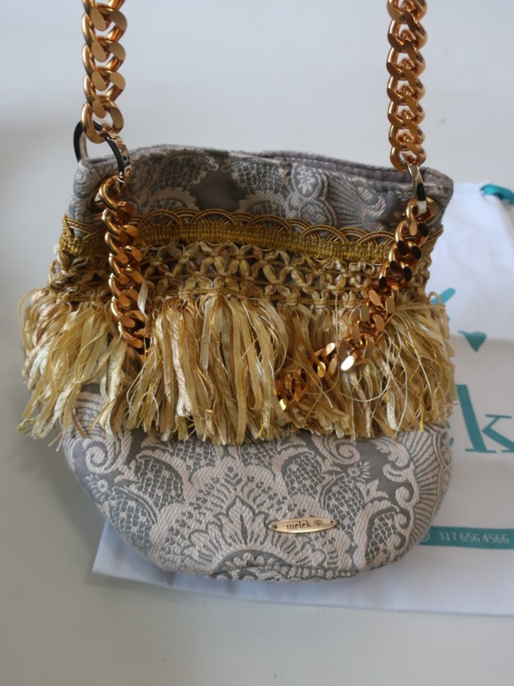 NWOT Womens Melek Gray Fabric Print Bag W/Gold Fringe and Chain Strap